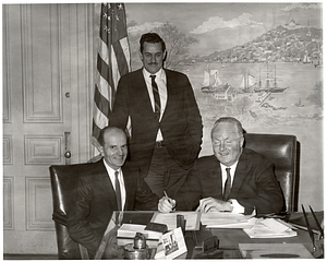 Two unidentified men with Mayor John F. Collins