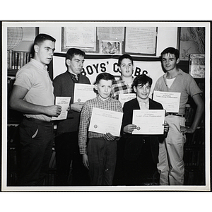 Six boys displaying certificates from the Boys' Clubs of America Games Room Tournament Sectional
