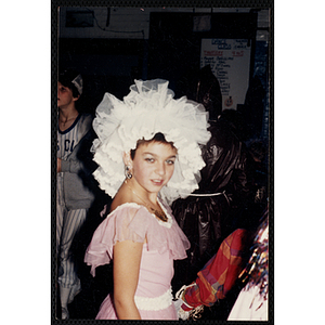 A girl poses in a her Halloween costume