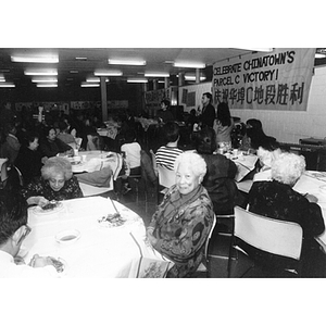 Guests attend a dinner celebration at the Josiah Quincy School marking Chinatown's victory to build a community center on Parcel C