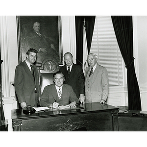 Signing of the bill authorizing the Metropolitan District Commission to sell the Boston Arena to Northeastern University