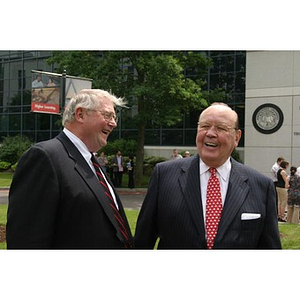 Neal Finnegan and Richard Egan laugh together at the Veterans Memorial groundbreaking ceremony