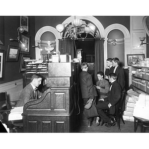 Galen Light, seated left, the Secretary and Treasurer at the YMCA Education Center