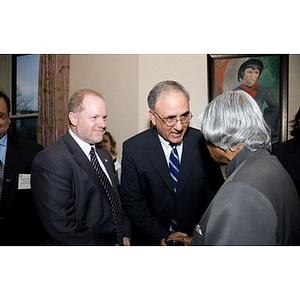 Dr. A. P. J. Abdul Kalam shaking hands with a guest at a reception