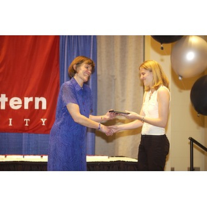 Jessica Maliszewski receiving a G. Rod McLeod Student Center Employee Award