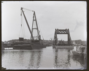 A view of a dredger and a barge on the Cape Cod Canal