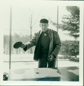 Walter Gropius playing ping pong, Gropius House, Lincoln, Mass., undated
