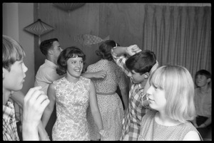 Teenage long hair: teenage girls at a dance party held in a room decorated  in mid-century modern style - Digital Commonwealth