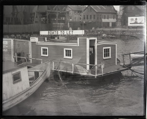 John P. Johnson ("Armless Johnson"): houseboat with sign "Boats to let" (interesting double exposure)