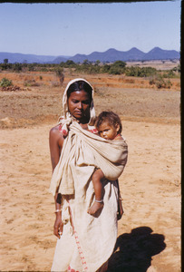 Birhor mother with child in a sling