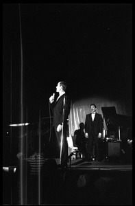 Winter Carnival: Johnny Carson at the microphone on the Johnny Carson Show, Curry Hicks Cage, UMass Amherst