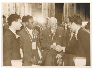 W. E. B. Du Bois shaking hands with unidentified delegate at the Afro-Asian Writers Conference in Tashkent