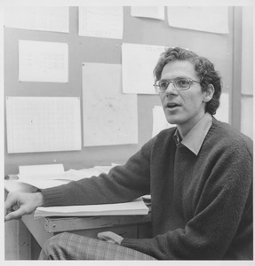 Joseph H. Taylor, UMass Amherst Professor of Physics and Astronomy, sitting at a desk