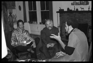 Michael Thelwell (right) speaking with Robert H. Abel and Johnnetta Cole, at the book party for Robert H. Abel