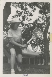 Bernice Kahn playing badminton at Camp Annisquam