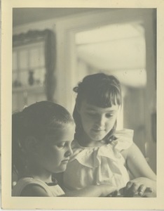 Unidentified woman and children