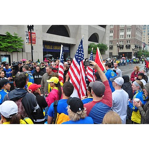 Crowd with flags at One Run finish line