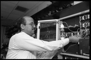 Colleague of Louis Carpino working in the lab