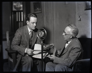 Sam Connor and Bob Emery: seated during a radio broadcast