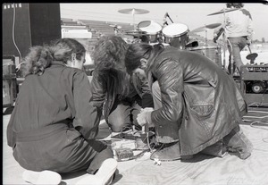 Hollywood Speedway Rock Festival: stage crew working on electrical outlets