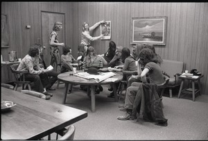 Jim Baker (with poster) talking to Free Spirit Press crew