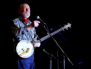 Pete Seeger and banjo on stage at the Spring Splash concert