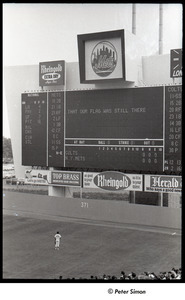 Mets at Shea Stadium: Shea Stadium scoreboard during the playing of the national anthem, Joe Christopher watches from the field