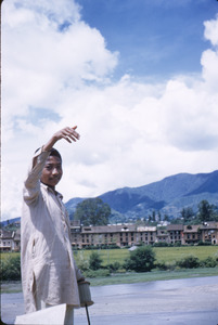 Boy prepares to fly a kite in Kathmandu