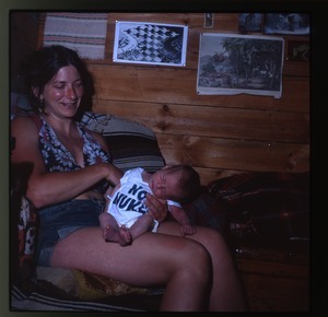 Nina Keller and baby (baby wearing a No Nukes t-shirt), Montague Farm Commune