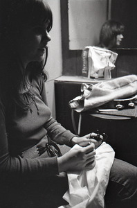 Linda Ronstadt at Paul's Mall: Ronstadt backstage, working on needlepoint