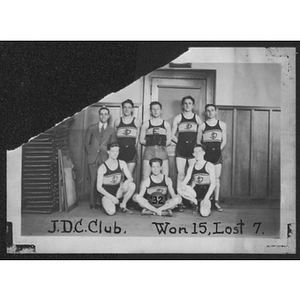 Group portrait of young men's "J.D.C. Club" basketball team