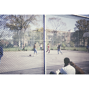 Boys playing basketball outside