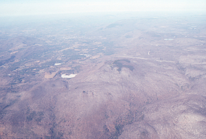 Oblique aerial photos accompanying 22 Dec 1994 Col-East air photo mission. 2. Summit of The Dome, Pownal, VT.