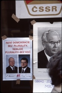 Posters of deposed and defaced Communist leaders on May Day