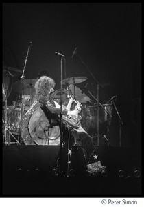 Jimmy Page playing his double-necked guitar, in concert with Led Zeppelin during their Physical Graffiti tour