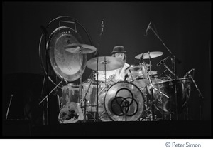 John Bonham behind his drum kit, in concert with Led Zeppelin during their Physical Graffiti tour