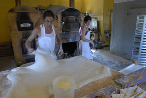 Hungry Ghost Bread: owners and bakers Jonathan C. Stevens and Cheryl Maffei working pastry dough