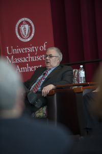 Congressman Barney Frank seated on the Student Union Ballroom stage, UMass Amherst, during his book event