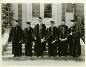 Hugh P. Baker standing outdoors with a group during Diamond Jubilee exercises