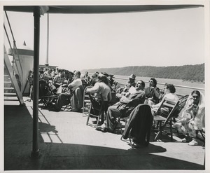 People sitting on boat deck