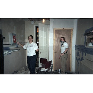 Volunteers painting a room in the Jorge Hernandez Cultural Center.