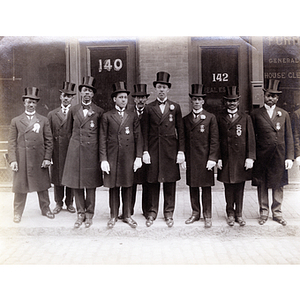Nine Freemasons pose for a group photograph