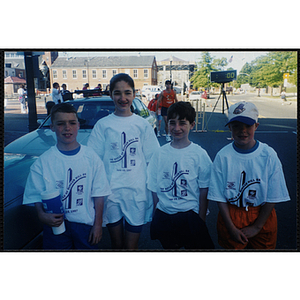 Three boys and a girl pose for a shot at the Battle of Bunker Hill Road Race