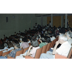 Audience seated in auditorium at Chinese Progressive Association's Fifth Anniversary Celebration