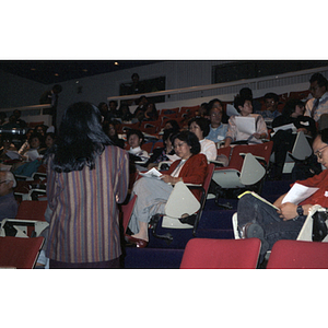 Suzanne Lee sits with others during a class at the University of Massachusetts