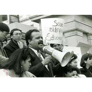 Speaker a rally held outside the Massachusetts State House protesting for bilingual education