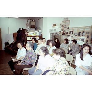 Association members chatting while waiting for a meeting to begin