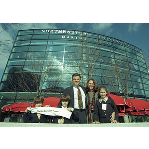 The Marino family poses in front of the Marino Recreation Center