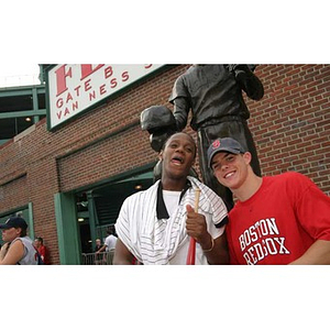 Michael Toney and Joseph Bordieri pose together outside Fenway Park