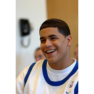 Torch Scholar Danny Vazquez smiles in class